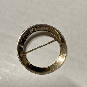 Elegant Gold-Tone Circular Brooch